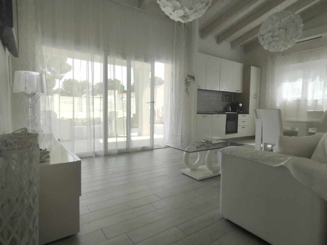 Ikebana Villas Porto Pino Beach Exterior foto