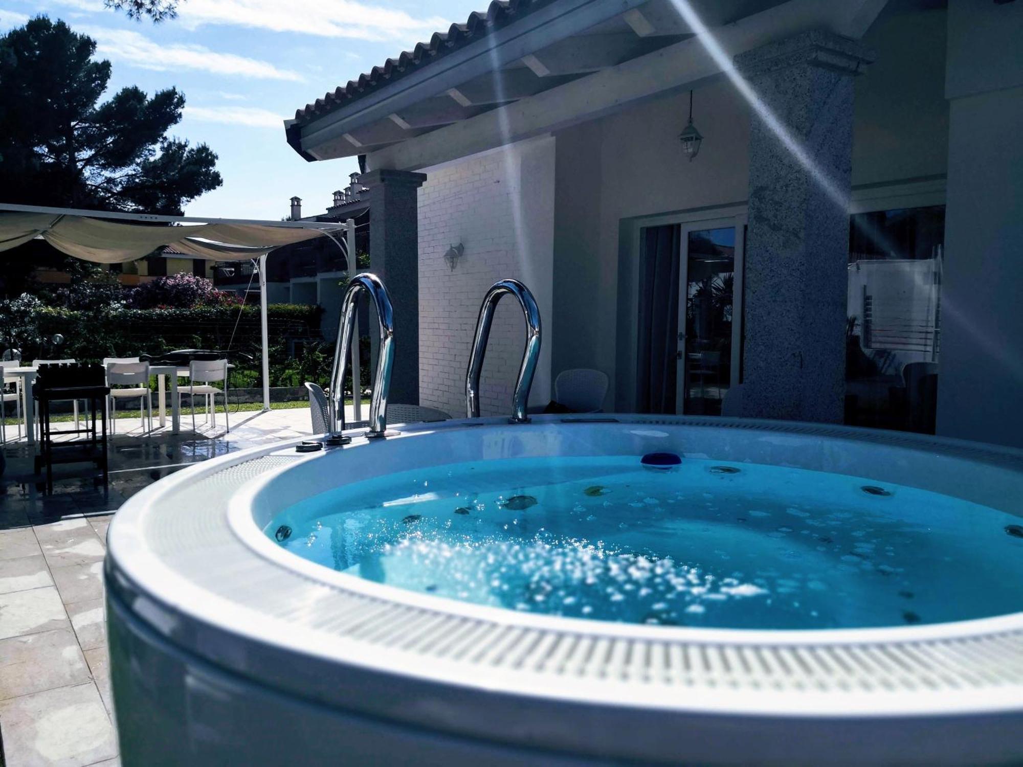 Ikebana Villas Porto Pino Beach Exterior foto