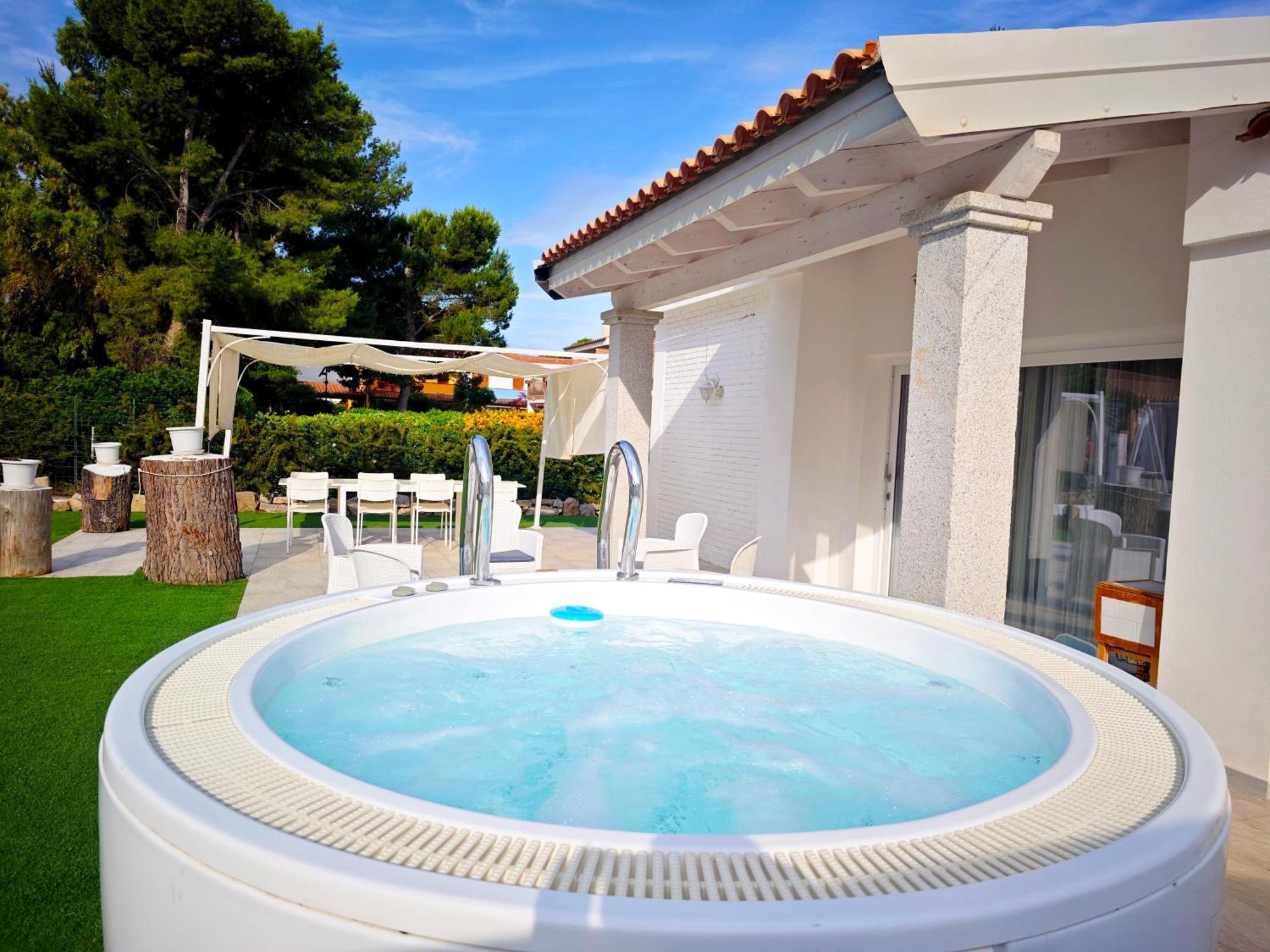 Ikebana Villas Porto Pino Beach Exterior foto